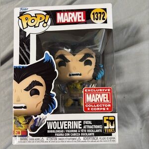 Funko Pop! Marvel Wolverine Figure - Blue, Yellow, Black
